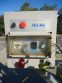 KAPS-ALL/FILLS-ALL 8 PISTON AUTOMATIC FILLER, WITH CONVEYOR