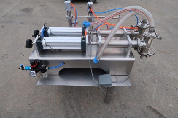 Quantitative Tabletop Dual Head Piston Filler, Air Operated