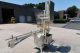 MRM 6 Spout Semi-Automatic Pressure Gravity Filler, with Motorized Conveyor