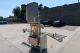 MRM 6 Spout Semi-Automatic Pressure Gravity Filler, with Motorized Conveyor