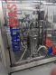 Apacks Six Head Automatic Mass Flow Meter Pressure Filling Machine, with conveyor