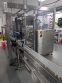 Apacks Six Head Automatic Mass Flow Meter Pressure Filling Machine, with conveyor