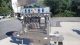 Acasi Six (6) Spindle Screw Capping Machine, 200 Per Minute